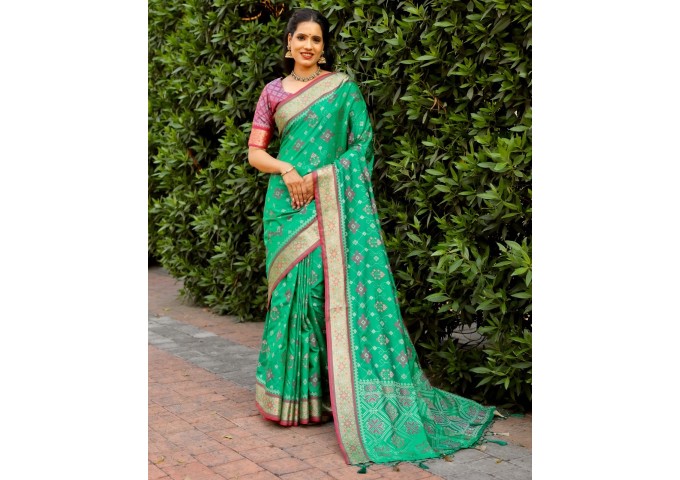 LAJVANTI IKKAT PATOLA SILK SAREE  PARROT GREEN