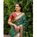 LAJVANTI IKKAT PATOLA SILK SAREE DARK GREEN