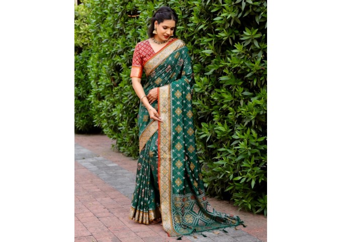 LAJVANTI IKKAT PATOLA SILK SAREE DARK GREEN