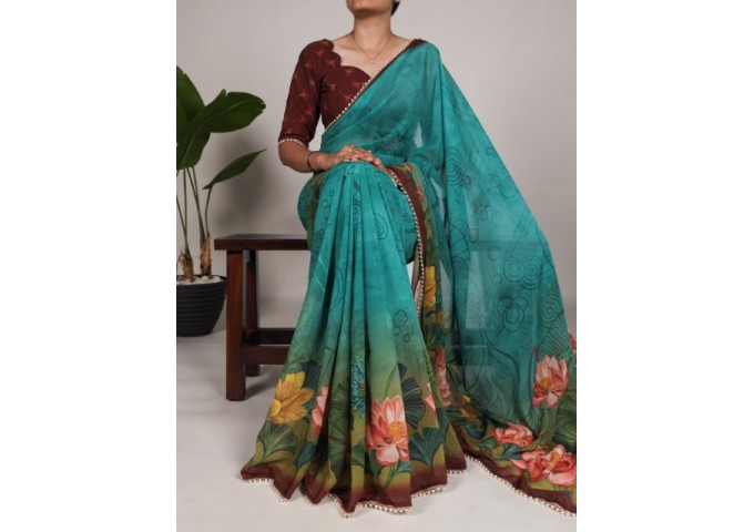 Chic With Floral Print With Pearl Lace Border Georgette Saree Shine Blue